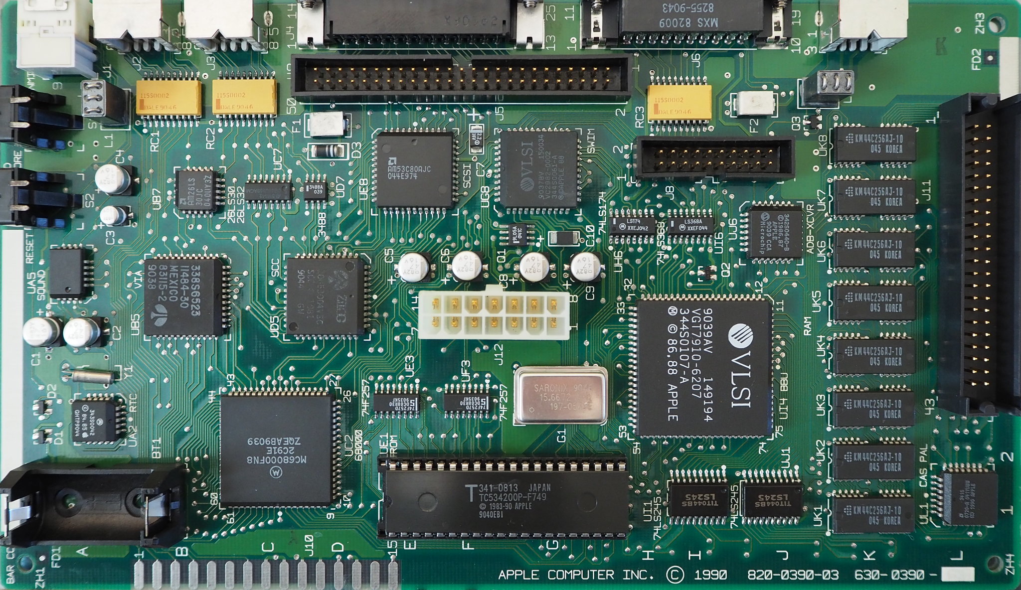 Apple Macintosh Classic logic board after cleaning and recapping